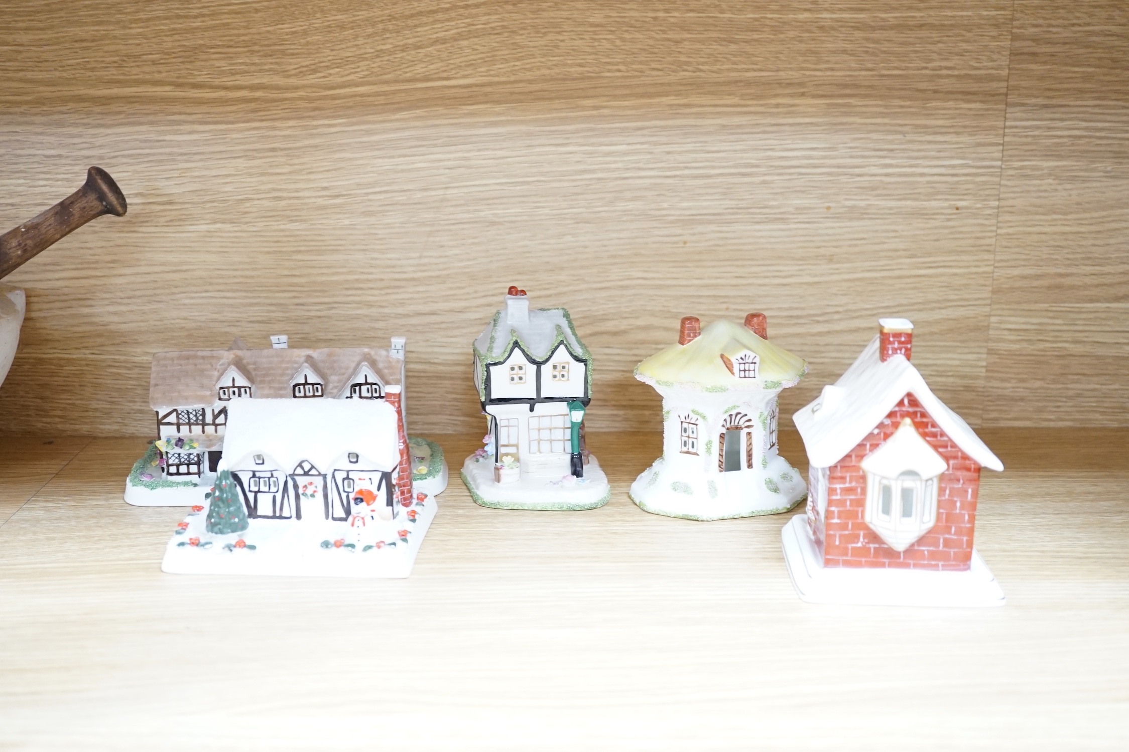 A collection of Eleven Coalport models of architectural and historic houses